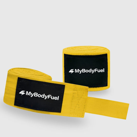 Gele MyBodyFuel bokswraps – 5 m katoen met duimlus en klittenband voor pols‑ en knokkelbescherming